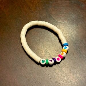 White bead bracelet with hearts